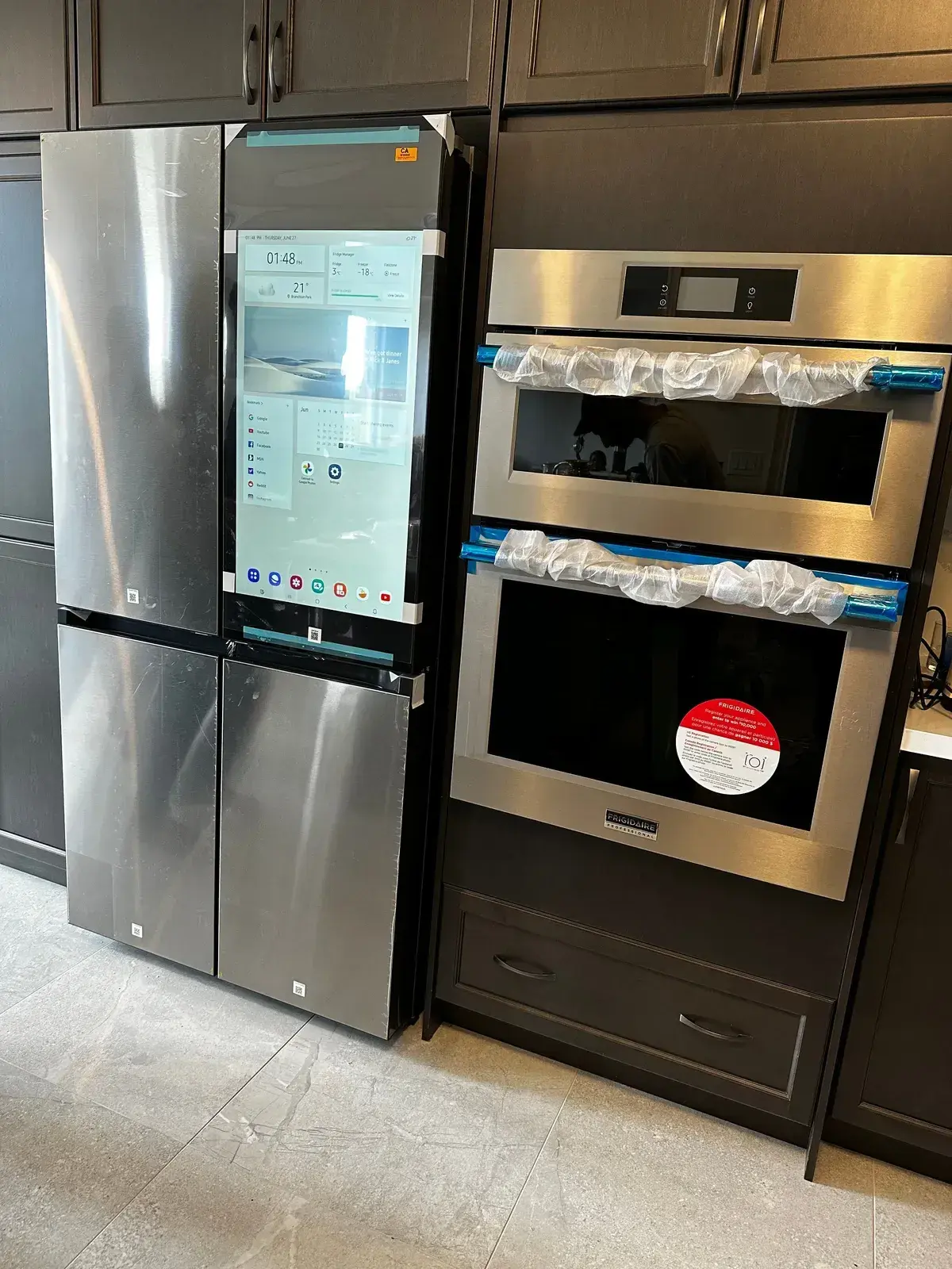 Samsung Family Hub fridge and double wall oven, film still on